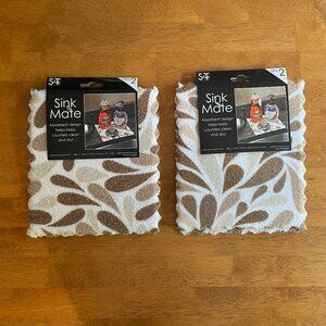 Two 2-packs brown white S&T Inc. Sink Mate absorbent pads (4 totals pads)